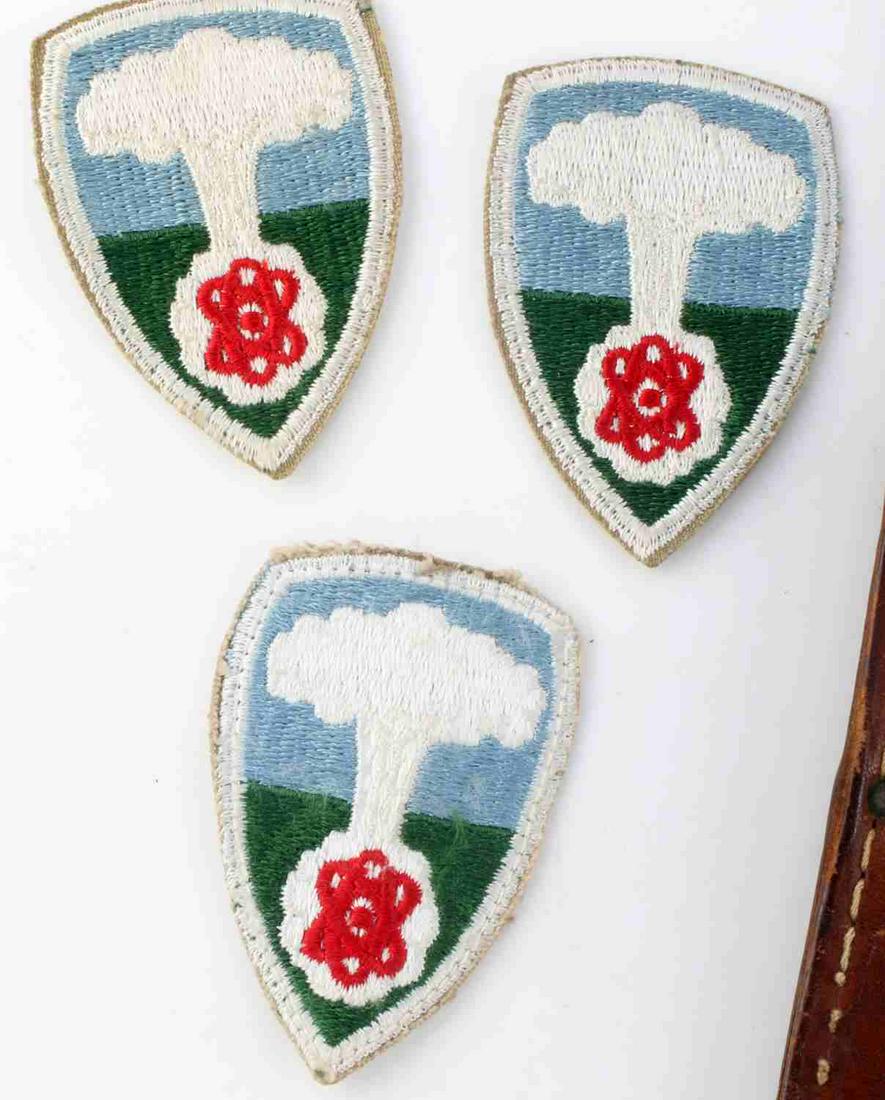 WWII AND LATER KNIFE SPECIAL FORCES PATCH PIN LOT: Items include: 1992 USMC Case XX knife with sheath, 3 Armed Forces Special Weapons patches, WWII British War Relief Society pin, sterling wings pin, Zippo lighter with name scratched out, and few othe