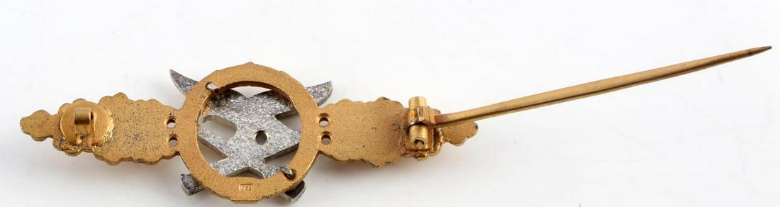 WWII GERMAN THIRD REICH LUFTWAFFE CLASP IN GOLD: WWII German Third Reich Luftwaffe Clasp in Gold, measures approx. 3 X 1 inches. Obverse displays NSDAP eagle with grenade and bayonet. Reverse is marked "L/58." Has a 'c' catch pin back with less than