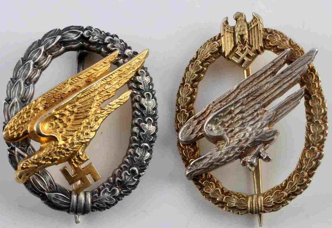 2 WWII GERMAN THIRD REICH PARATROOPER BADGES LOT: Lot of two WWII German Third Reich Luftwaffe Paratrooper Badges, each measure approx. 1.75 X 2.25 inches. Obverses displays diving Luftwaffe Paratrooper eagles surrounded by oak leaf wreaths. Reverse 
