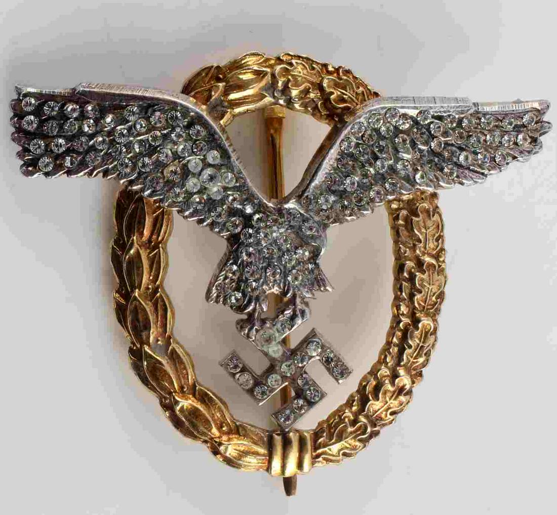 WWII GERMAN LUFTWAFFE OBSERVER BADGE W DIAMONDS: WWII German Third Reich Luftwaffe Pilot Observer Badge with Diamonds, homage piece. Measures approx. 2.75 X 2.25 inches. Obverse displays simulated diamond covered spread winged eagle with emblem and 