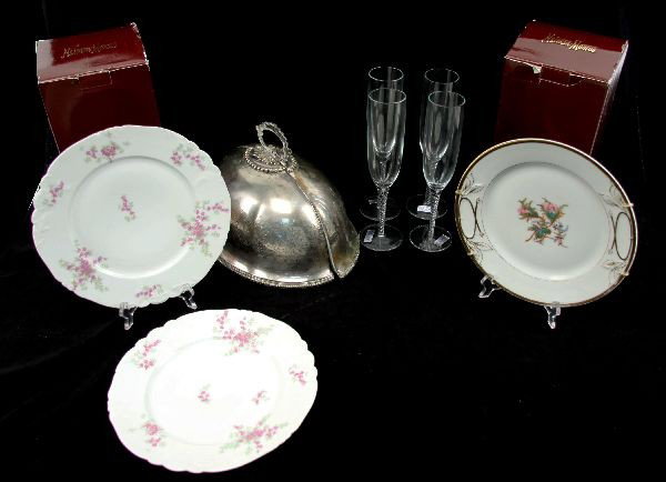 NEIMAN MARCUS CHAMPAGNE FLUTES HAVILAND & MORE: Lot containing (8) 8oz Neiman Marcus champagne flutes with original boxes, a 9.5 inch decorative Haviland plate, (2) 10 inch Limoges floral dinner plates, and a soldered silver plated dome platter cov