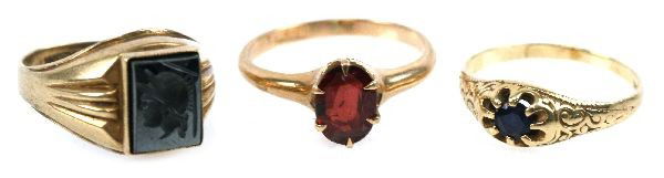 LOT OF ANTIQUE YELLOW GOLD INTAGLIO SAPPHIRE RINGS: Size 5.5 14K gold ring with an approx. 0.12ct round cut sapphire in an eight-prong setting. Size 6 10K gold ring with a 6.5x8.4mm intaglio of a Spartan. Size 6 10K gold ring with an approx. 1.0ct oval