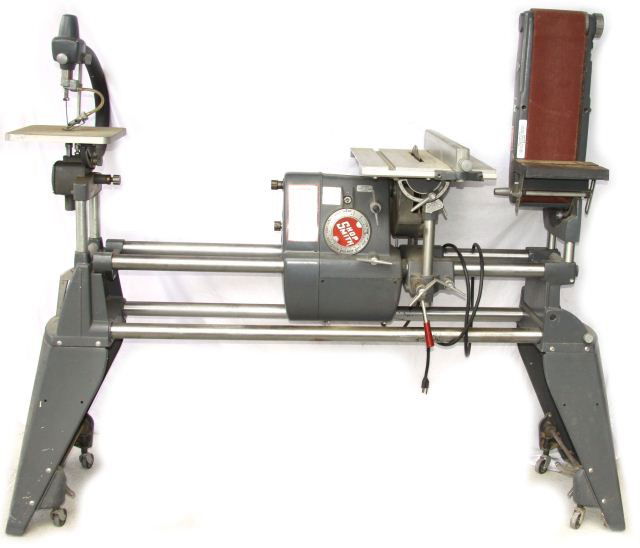 SHOPSMITH MARK V MULTI TOOL WITH ATTACHMENTS: SHOPSMITH MARK V MULTI TOOL WITH ATTACHMENTS This is a complete wood working shop in one tool. It features a 10 inch table saw, a 16.5 inch vertical drill press, a horizontal boring machine, a 34 inch