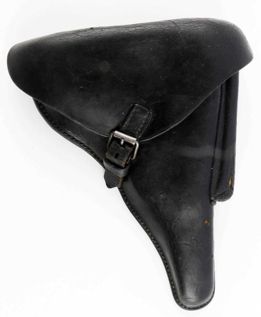 WWII GERMAN REICH LEATHER PO8 LUGER HOLSTER: WWII German Reich leather PO8 Luger holster. Marked on reverse side "1940" and has a Waffenamt marking with an indistinguishable factory code which appears to start with a "2". The right belt loop is 