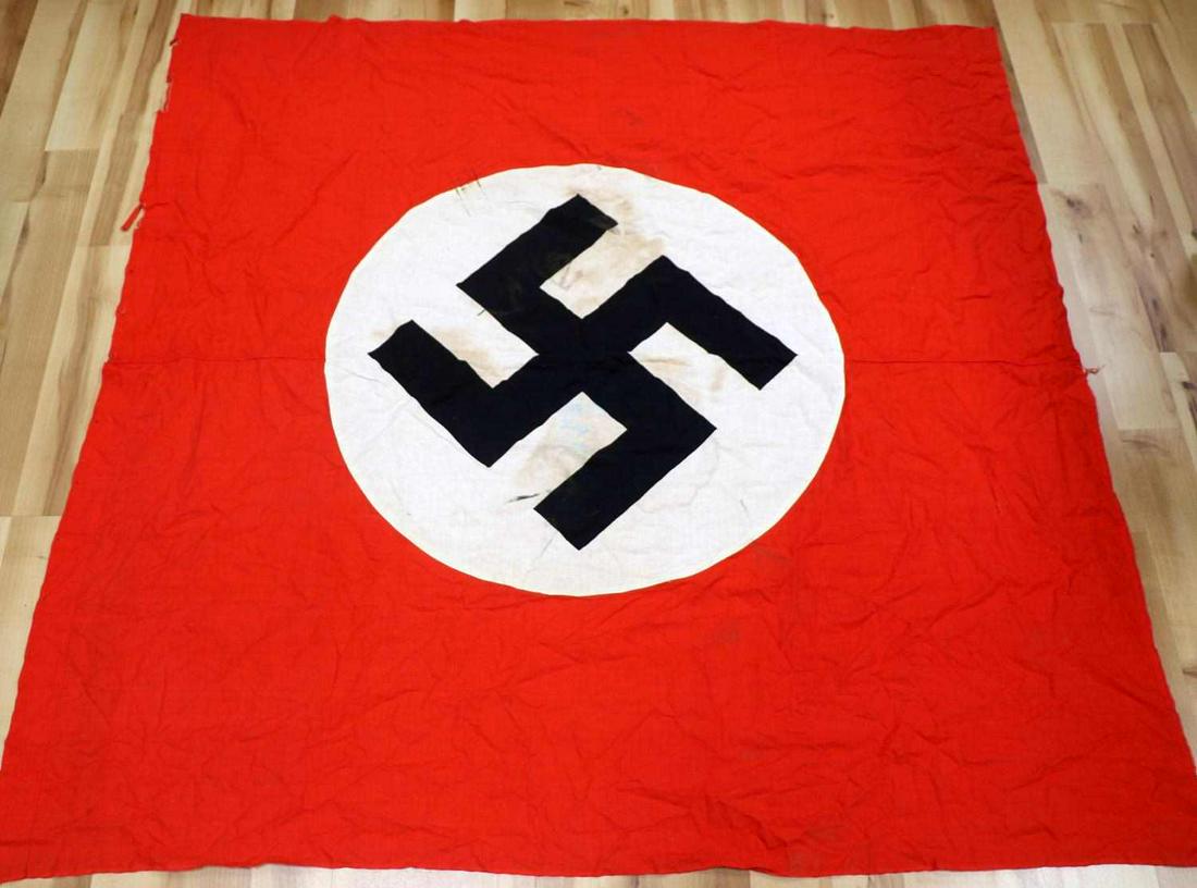 WWII GERMAN THIRD REICH NATIONAL FLAG: Measures 57 by 57, has some wear and staining to roundel, otherwise good original condition.