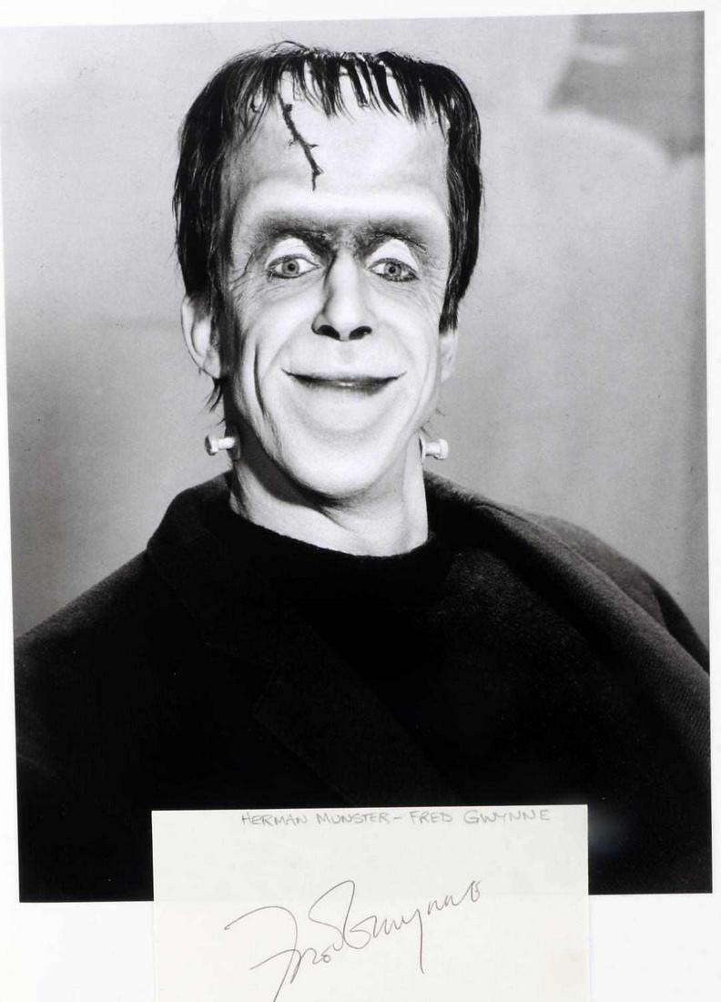 FRED GWYNNE SIGNED CARD WITH PHOTO MUNSTERS: 8 X 10 inch photo of Fred Gwynne as Herman Munster, with signed card. Very good condition.