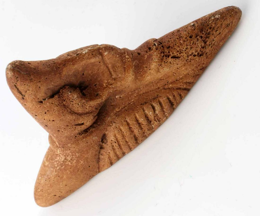 NATIVE AMERICAN TAINO ZEMI OR TRIFORM ANTHROPIC: Taino Bone zemi or Triform with Anthropic face. Type 2 zemi (Fewkes 1913). This type of artifact is only found in the Caribbean Island chain. Manatee bone. c 1000-1500 AD. Length 3.71 inches. Curated 
