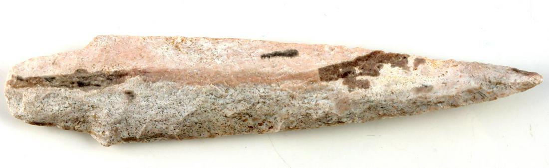 ARCHAIC NATIVE AMERICAN 6 INCH ADENA ARROWHEAD: Archaic period 6 inch Adena arrowhead. Heavily worn stem and edges. Rhomboidal shaped body. Southern Missouri found. Ex Jack Roberts collection.