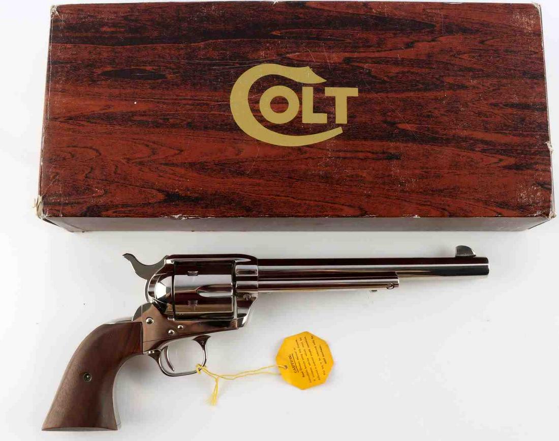 COLT SAA .44 SPECIAL 6 SHOT REVOLVER IN BOX NICKEL: 1980's manufacture. Near mint nickel finish, maker, model, and caliber marked to left side of 7 5/8 inch barrel, bright clean bore, patent dates to left side frame, serial number to underside, maker m