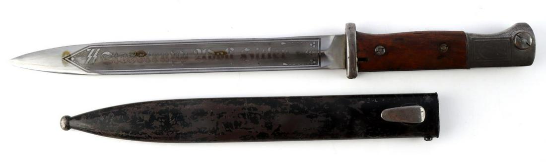 WWII GERMAN REICH EARLY STOSSTRUPP HITLER DAGGER: WWII German Reich early Stosstrupp-HItler K98 homage bayonet with scabbard. Blade is etched "Meine ehre heisst treue" on one side, and "Stosstrupp Adolf Hitler" on the other side. Pommel is etched "SS