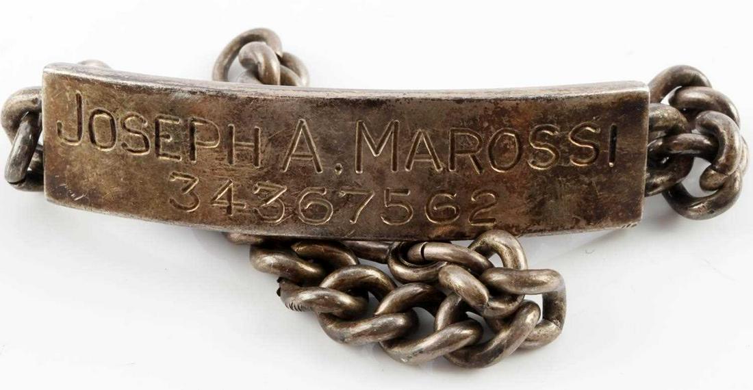 WWII US STERLING ID BRACELET NAMED AND NUMBERED: Named to Joseph A. Marossi, number 34367562, marked sterling to reverse. Both name label and chain test as silver. Weighs 29 grams. Very good condition.
