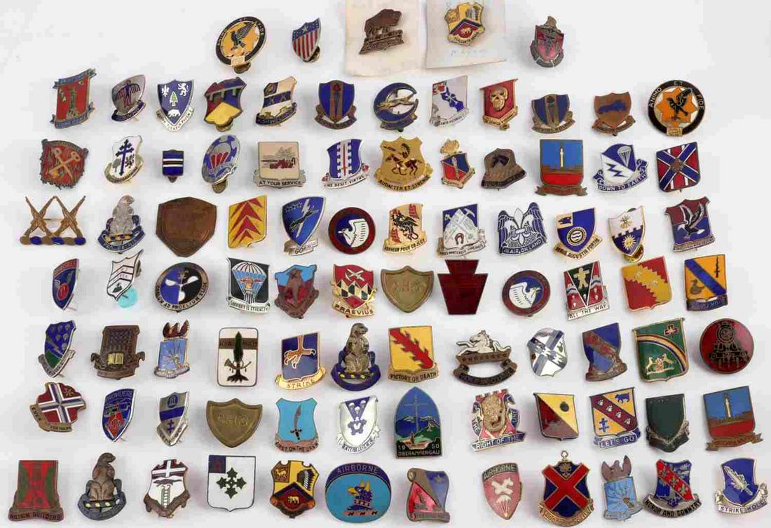 1.6 POUNDS US MILITARY DUI PINS WWII TO MODERN: Lot features a variety of D.U.I. from the US military. Units include Quarter master, Airborne, Infantry, and many more. Very good condition. Measure approximately 1 inch. Some sterling bust mostly bra