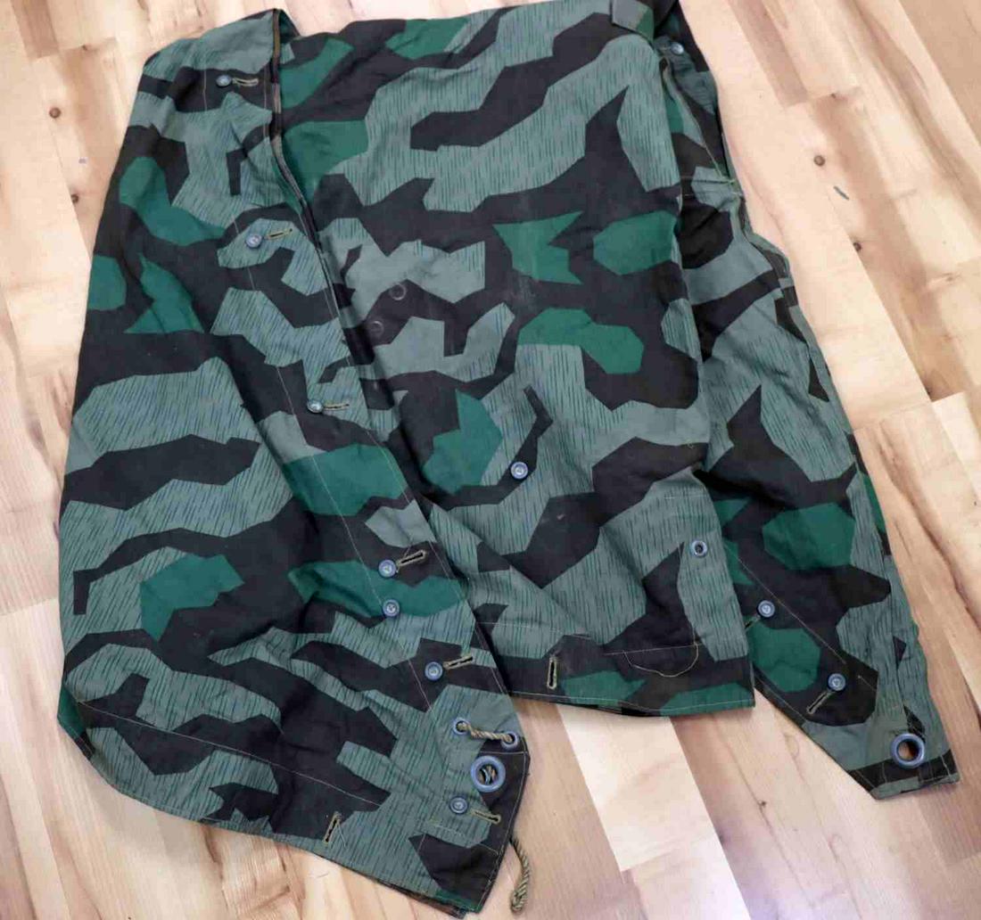 WWII GERMAN THIRD REICH REVERSIBLE CAMO TENT: Splinter camo pattern with 2 different colors for reversible action. Cotton construction with zinc buttons. Original piece. Measures 67 X 90 inches. Very good condition.