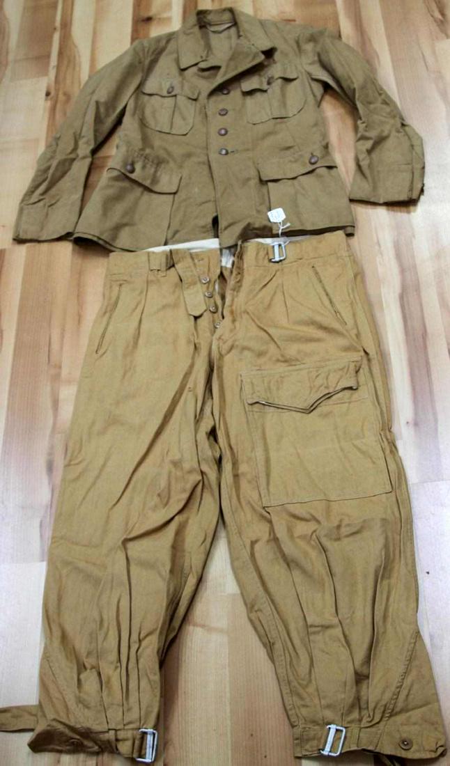 WWII GERMAN REENACTOR LUFTWAFFE TROPICAL UNIFORM: German Third Reich Luftwaffe tropical tunic and trousers. Reichsadler patch removed. Very good condition. High quality pieces. Size large.