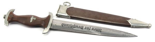 WWII GERMAN SA DAGGER GEBRUDER HELLER MARKED: WWII German SA dagger. Maker marked Gebruder Heller, Schmalkalden, with anchor logo. Some scabbard wear and minor oxidization to blade. Scabbard is good, with some fading of paint, and handle is very 