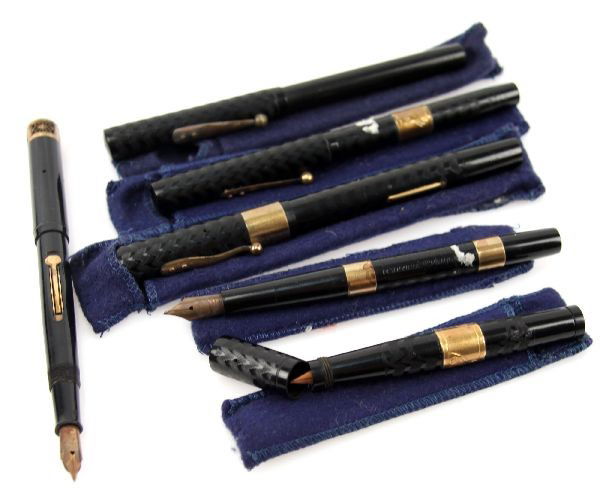WATERMAN IDEAL 52 HARD RUBBER FOUNTAIN PEN LOT: Grouping of (6) vintage Waterman Ideal No. 52 black hard rubber pens. Quantities and details as follows; (1) eye dropper filled No 52 1/2 slight oxidation on clip, (1) with lever gold filled trim and