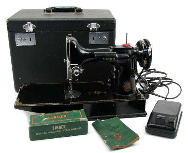 SINGER FEATHERWEIGHT SEWING MACHINE 221-1: Singer model 221-1 in very good condition with attachments in original box, manual, and cord.