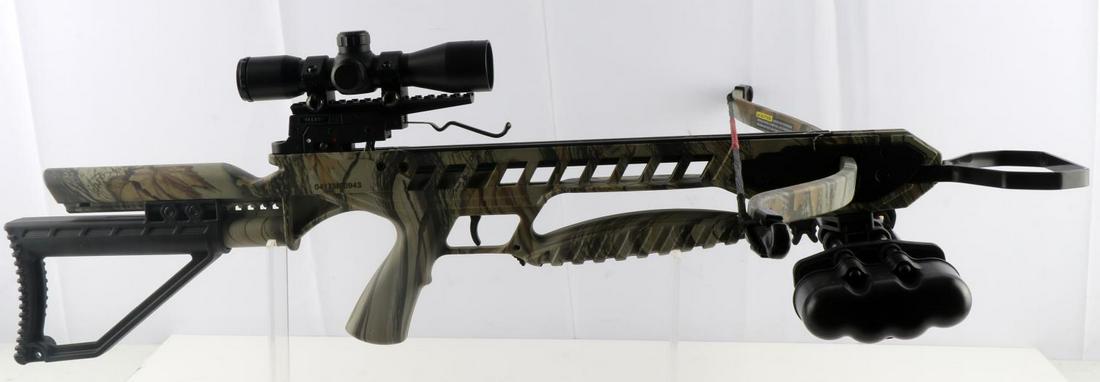 CENTER POINT XB21 CROSSBOW W SCOPE & ARROWS: Serial number marked to right side, model on label to underside, adjustable rear stock. Comes with Center Point 4 X 32 scope attached and two arrows. Measures 33 inches long including hanger handle. V