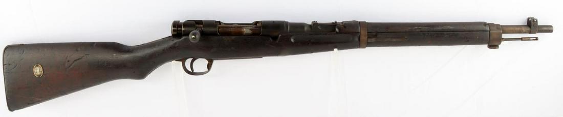 WWII IMPERIAL JAPANESE ARISAKA TYPE 38 CARBINE: WWII Japanese Arisaka Type 38 carbine 6.5mm rifle measuring 38 1/4 inches long in total. Features a bright and clear bore. Action is smooth and functions without issue. Metal on gun is in worn conditi