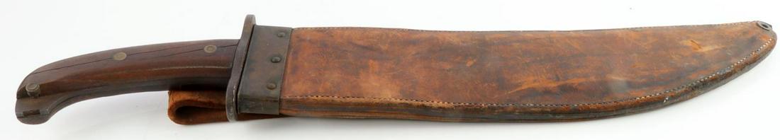WWI 1917 U.S. BOLO M17 KNIFE W SHEATH: Stamped 1917 with ordnance flaming grenade, stamped U.S with S/N 55778, some loss to wood at pommel, otherwise very good original condition. Tight and secure in scabbard.