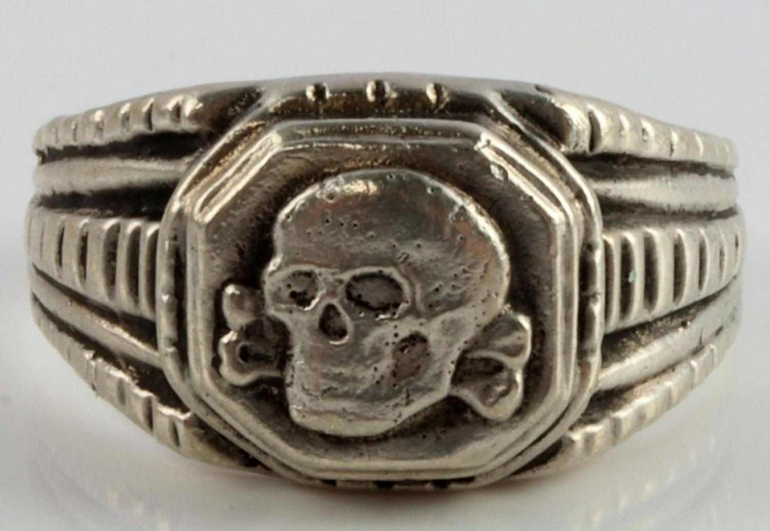WWII GERMAN THIRD REICH WAFFEN SS PANZER RING: Silver ring with totenkopf in center. Interior engraved SS FRW. PZ. Gr. Div. Nordland.1.3.44. Very good condition. Size 11 1/2.