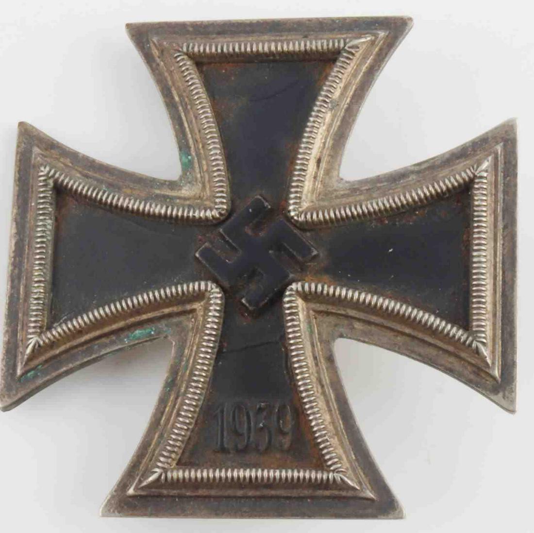 WWII GERMAN THIRD REICH IRON CROSS 1ST CLASS: Three piece magnetic core with wasted coke bottle pin, very good original condition, with nice patina.