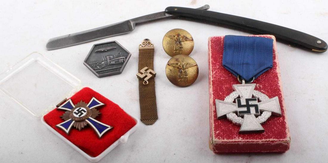 WWII GERMAN REICH ITEMS MEDAL FOB BLIMP RAZOR: Includes boxed 25 year Civil service , blimp badge, Swastika watch fob, Bakelite grip Swedish made straight razor with correct imbedded Reichsadler, 2 NSDAP buttons, Mother Cross in plastic case.