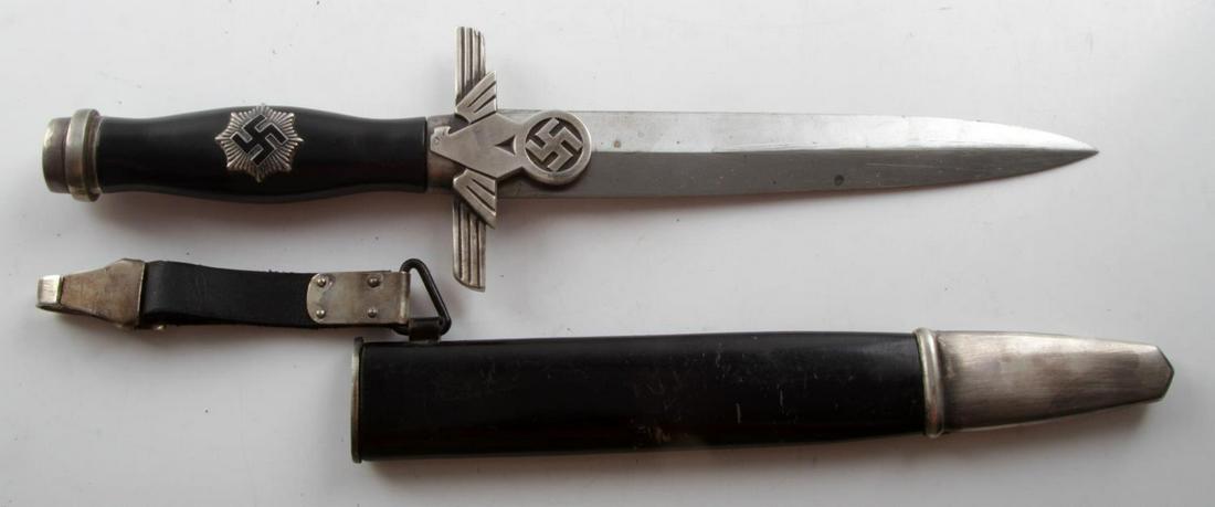 WWII GERMAN THIRD REICH 2ND MODEL RLB DAGGER: WWII German Third Reich 2nd model RLB dagger with scabbard. The tang, pommel, crossguard, and grip are all marked "3" and are in very good condition. Grip is made of wood with black lacquer. Blade is