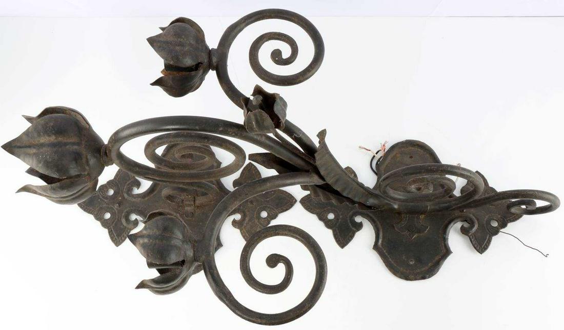 LARGE VINTAGE SPANISH REVIVAL WALL SCONCE: Cast and cut iron wall sconce with a Spanish revival flare. Vintage, wired, exterior or interior decor piece. Condition: good with aged patina. Dimensions: 27x16x13 inches.