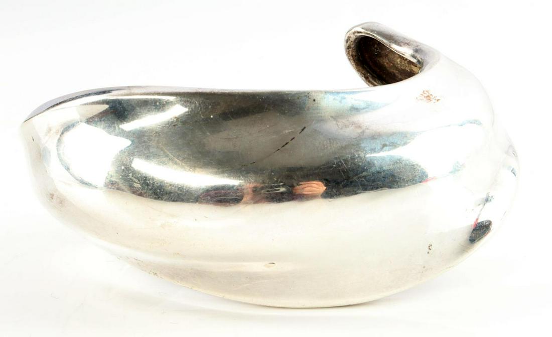 ROBERT LEE MORRIS DESIGNER STERLING CUFF BRACELET: Stamped "ROBERT LEE MORRIS 925" inside cuff. Bracelet measures 7 inches in circumference including gap. Bracelet is 1.5 inches wide and weighs 55.2 grams and is in very good condition with limited sig