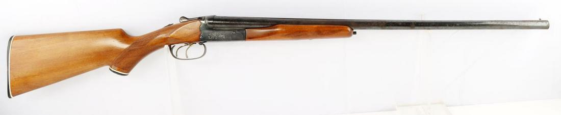 FIE 20 GAUGE DOUBLE BARREL COACH GUN SHOTGUN: FIE 20 Gauge etched double barrel shotgun coach gun in good condition. Barrels measure 26 inches long. Break action works without issue as does safety. Some oxidation and pitting intermittent througho