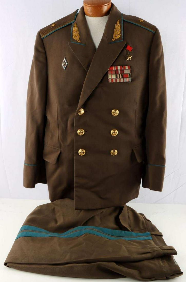 SOVIET RUSSIA COLD WAR GENERAL UNIFORM W MEDAL: Trousers and tunic, with ribbons and 2 medals, wearable 36 inch trousers, about a 42 U.S. tunic.