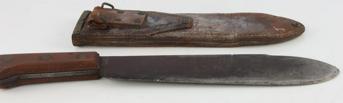 WWII USMC MARINE BOLO CORPMAN KNIFE: Dark but very good blade, some wear to scabbard but intact and original.