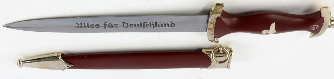 POST WWII GERMAN REICH SA HONOR DAGGER: Post-war constructed steel blade with traditional SA motto and Boker maker mark. Wooden grip, nickel crossguards, steel scabbard. Measures 14 1/4 inches. Very good condition. Unauthenticated, sold "as