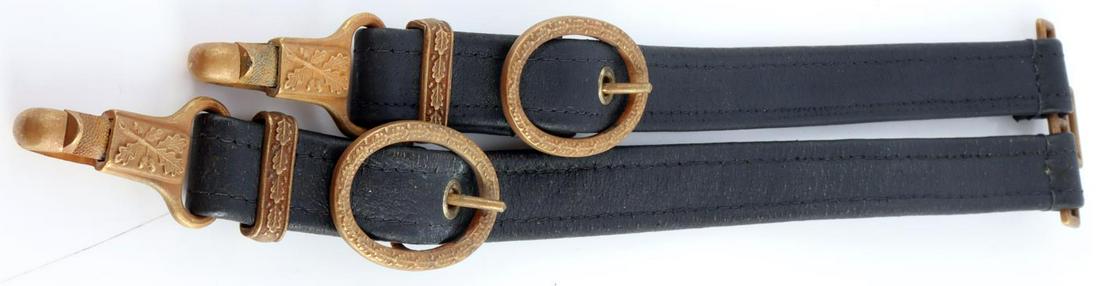 WWII GERMAN REICH LEATHER DAGGER HANGERS: WWII German Reich Leather dagger hangers in good condition. Marked "A" on reverse of each clasp. Does not fluoresce. Unauthenticated, sold as is.