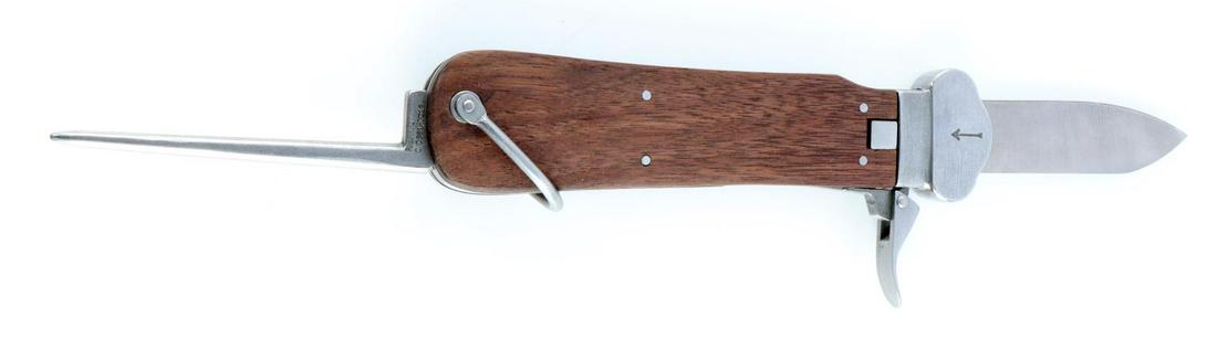 WWII GERMAN LUFTWAFFE PARATROOPER GRAVITY KNIFE: Luftwaffe gravity knife. Steel blade with wooden grip. Mechanism works. Measures 10 inches. Unauthenticated, sold as is. This lot has a reserve.