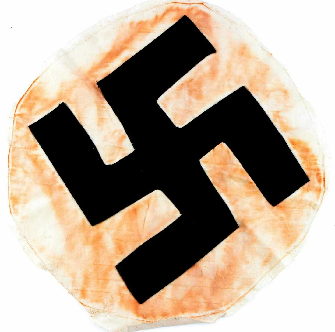 WWII GERMAN THIRD REICH SWASTIKA FLAG ROUNDEL: Central roundel from a swastika flag. Swastika sewn into white cloth. Measures 16 inches in diameter. In very good condition. Does not fluoresce.
