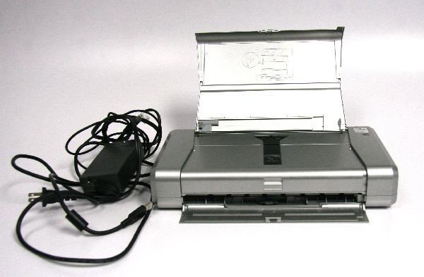 CANON PIXMA IP100 MOBILE PHOTO INKJET PRINTER: Includes Canon Pixma iP100 photo printer, USB cable and power cord. Very good condition.