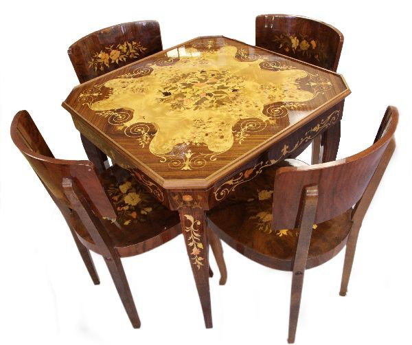 ITALIAN INLAID GAME TABLE WITH FOUR INLAID CHAIRS: A wonderful inlaid table from Italy with removable top that flips to expose inlaid backgammon board. A second top for chess/checkers or which flips for felt top card table. Below that is a roulette ta