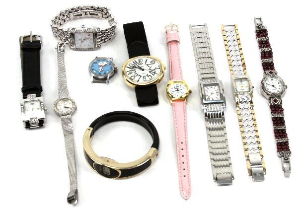 LOT LADIES FASHION WATCHES-KENNETH COLE ANNE KLEIN: Lot of ladies fashion watches including; Kenneth Cole, Anne Klein, Collezio, CYMA, Helbros, Platini, & Quartz. Condition: Good