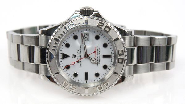 MENS FAUX ROLEX YACHTMASTER WATCH: A very accurate replication of a men's Rolex Yachtmaster watch. With faux Rolex box. Condition: Very good