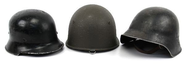 SWISS PARATROOPER GERMAN POLICE HELMET LOT OF 3: A lot of three helmets a Swiss Army helmet with liner and chin strap, Swiss Paratrooper with liner and chin strap, lastly a German Police helmet Swastika removed with liner and chinstrap.