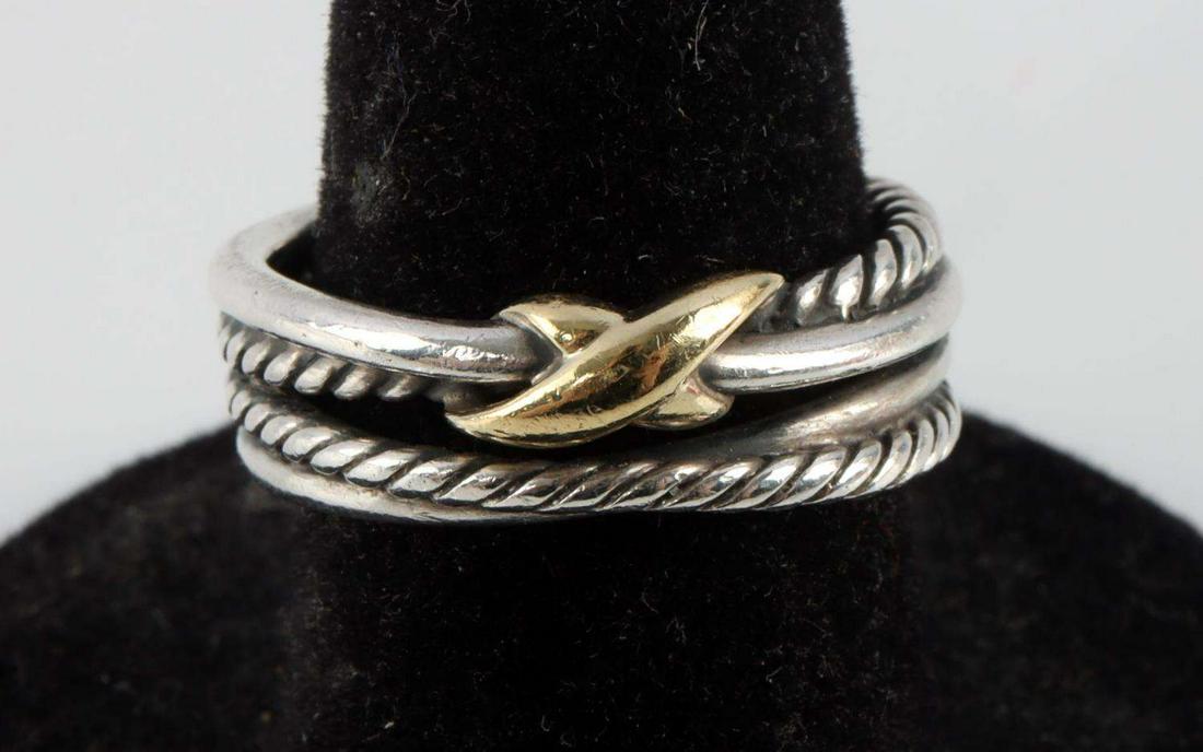 DAVID YURMAN X CROSSOVER BAND RING WITH 18K GOLD: David Yurman X Crossover Band Ring with 18K Yellow Gold. Size 6, interior is marked "D.Y. 925 750". Weight is 4.8 grams. Very good condition. This lot has a reserve.