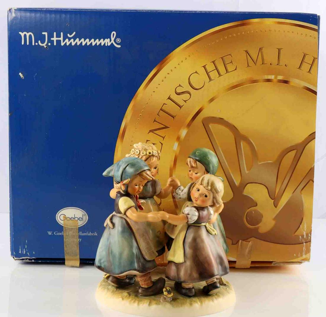 HUMMEL 348 RING AROUND THE ROSIE PORCELAIN FIGURES: Measures 7 1/8 inches. Very good condition with no crazing or chipping. Comes with box.