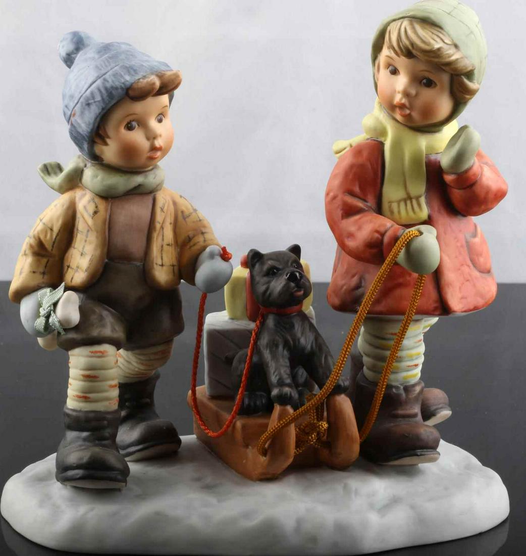 HUMMEL BH 60 PORCELAIN FIGURINE SLEDDING TIME: In original box without damage.