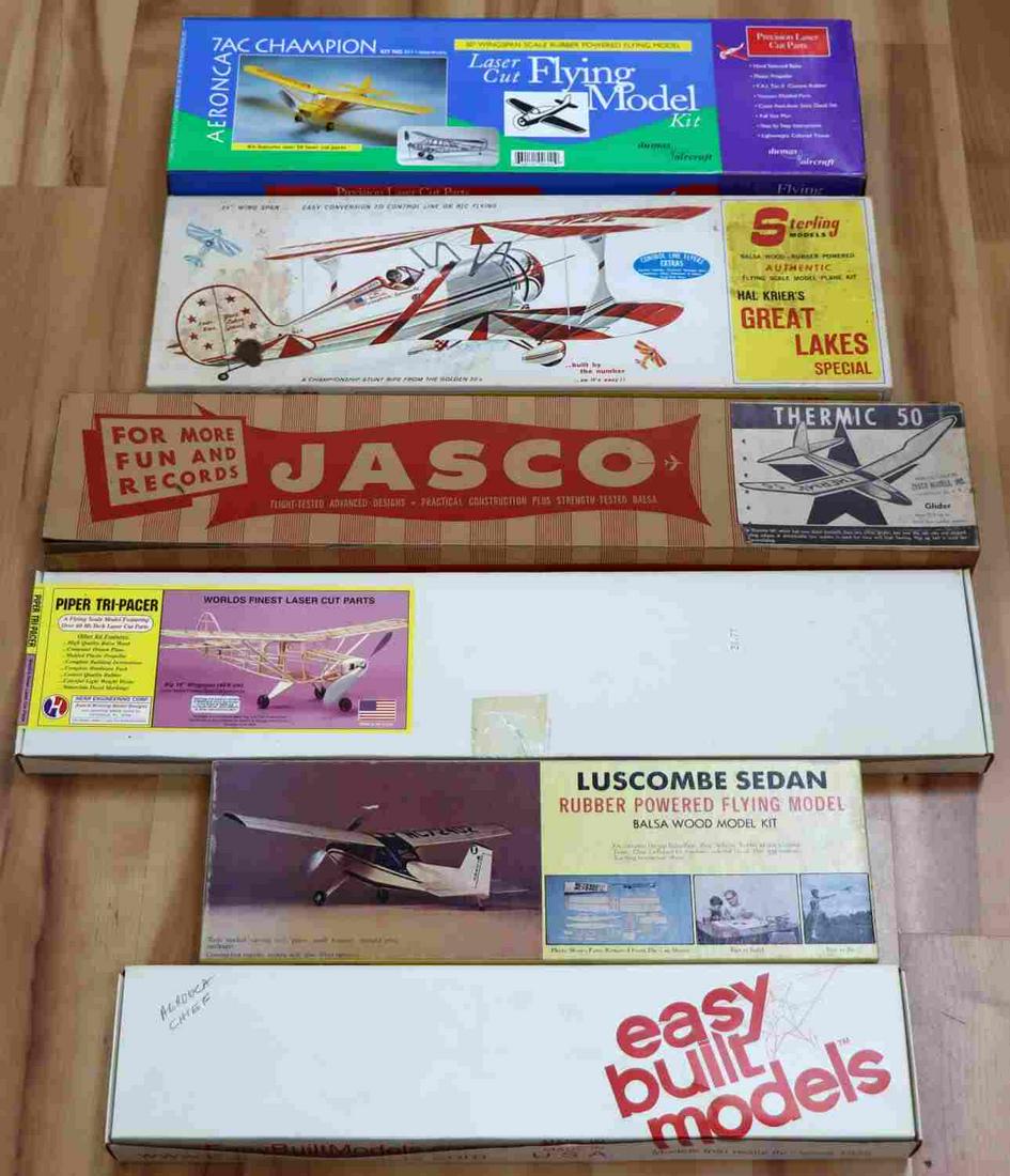 6 VINTAGE RUBBER POWERED BALSA MODEL AIRPLANE LOT: All are complete and buildable, all rubber powered or glider, includes Dumas Aeronca, Herr Piper , Easy Built model glider, Sterling Luscombe Sedan, Hal Kriers Great lakes, Jasco glider.