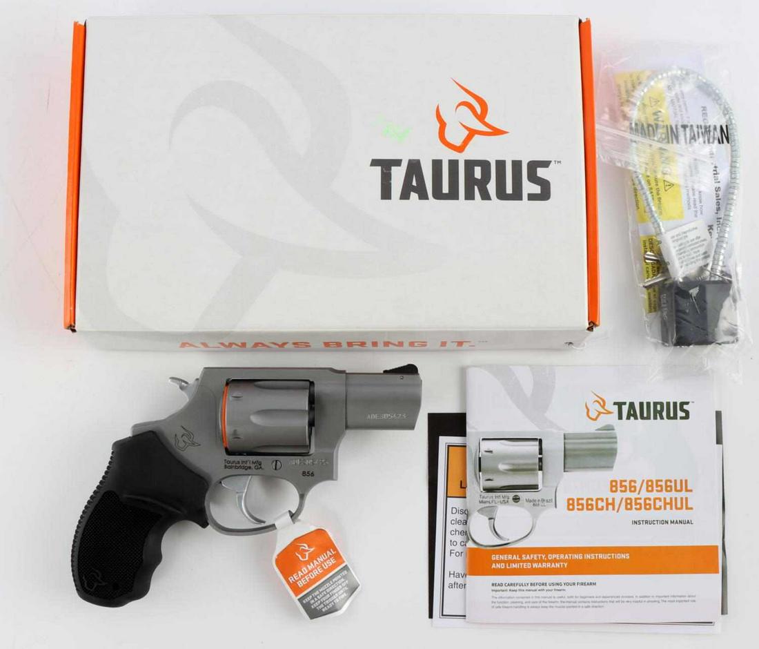 NEW IN BOX TAURUS 38 SPECIAL REVOLVER M856 FIREARM: New in box Taurus 38 Special 856 Revolver, measures approx. 7X5 inches. Single / double action, holds 6 rounds, 2 inch barrel, serrated ramp front sights with fixed rear sights. Comes new in box with 