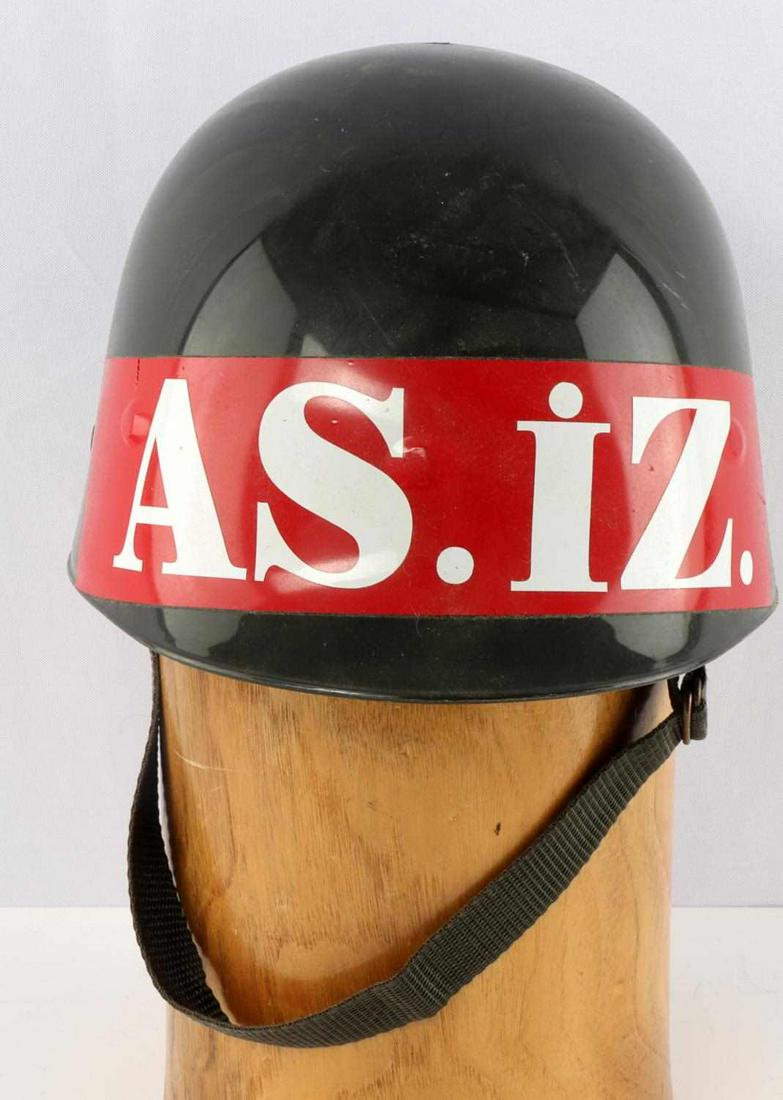 TURKISH ARMY MILITARY POLICE MP M1 CEREMONY HELMET: Turkish Army Military Police M1 ceremonial helmet. Green hard plastic construction. Turkish shield above right ear. Red and white Askeri Inzibat sticker to the front. Green cloth sweatband and chin st