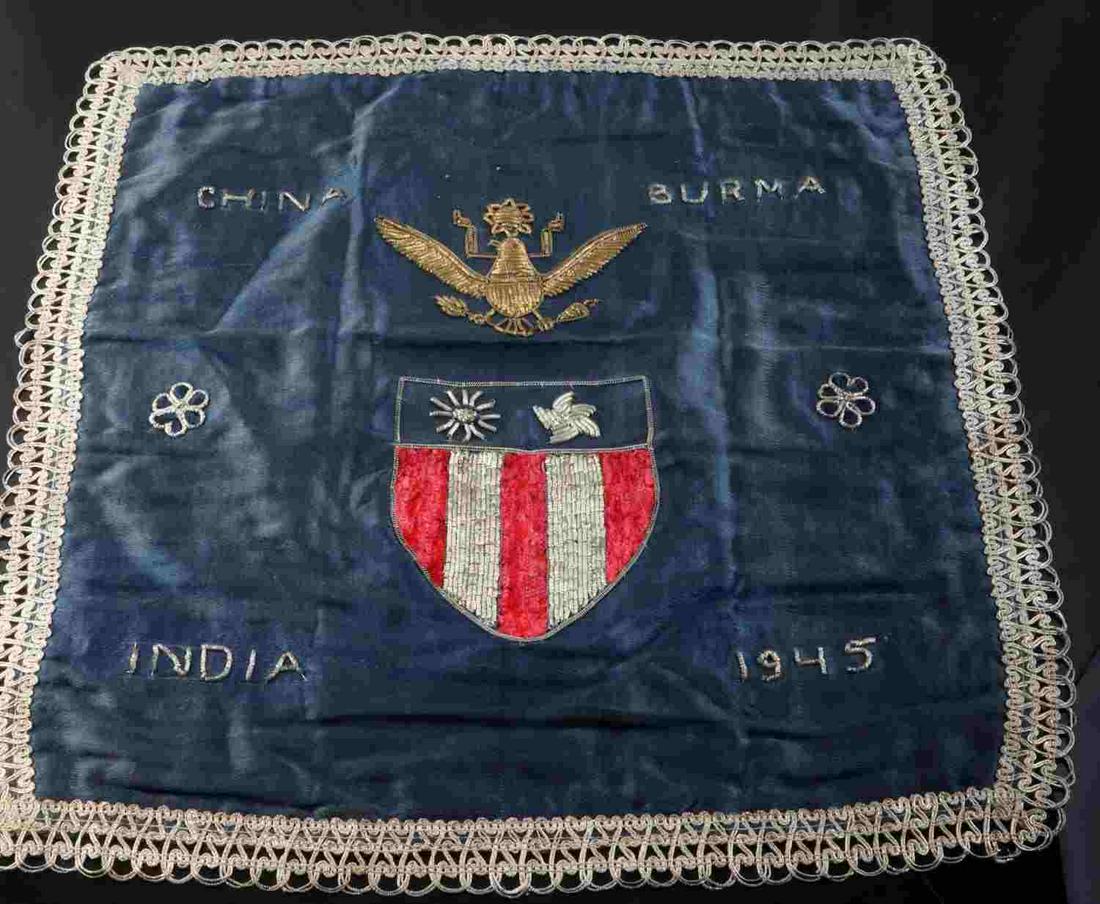 WWII US ARMY CBI 1945 COMMEMORATIVE FABRIC TEXTILE: WWII US Army CBI 1945 fabric piece in good condition with bullion designs throughout. Measures 15 1/2 inches wide by 13 5/8 inches tall. Does not fluoresce.