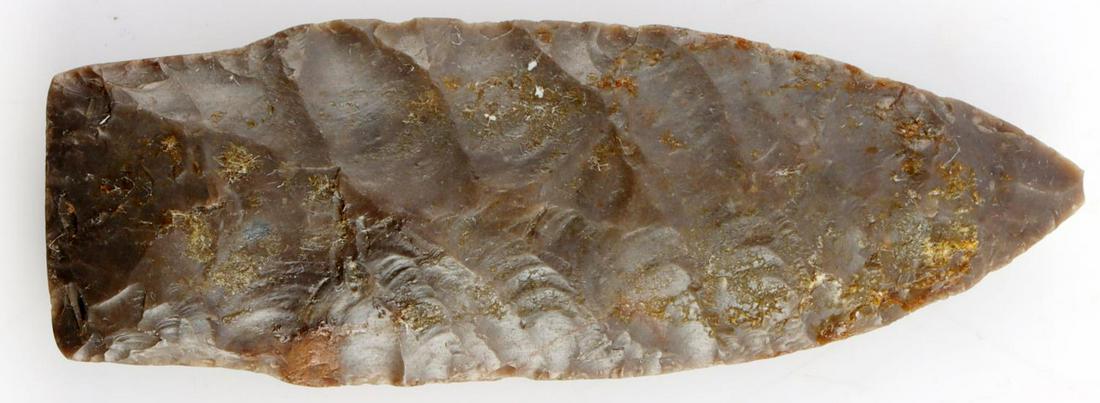 PALEO NATIVE AMERICAN TRANSITIONAL ARROWHEAD: Nice transitional Paleo Lancelot. Rich patina with nice mineralization. Reverse has glue but can be removed. Measures 3 1/4 inches. Very good condition.